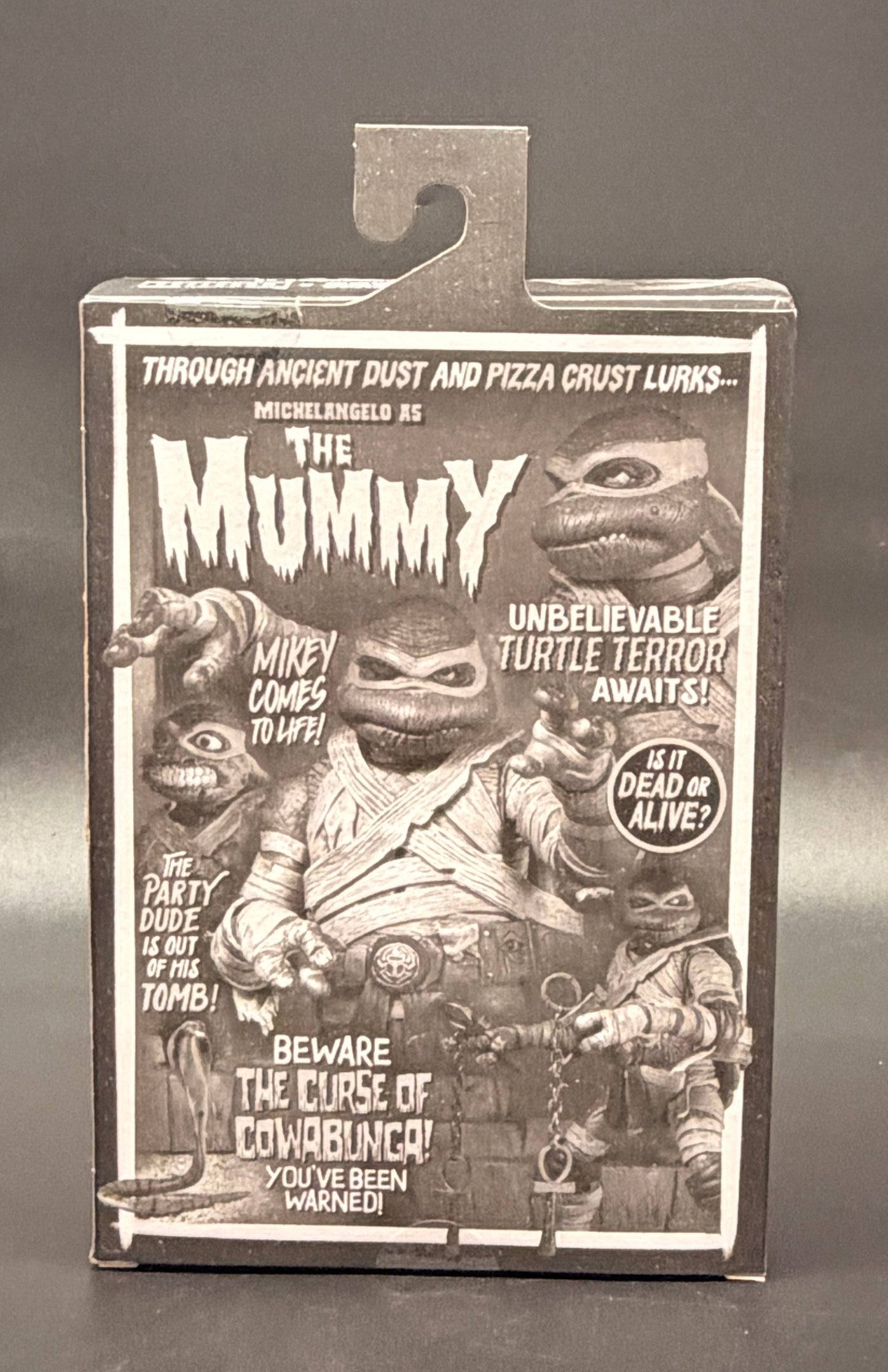 The Mummy (Michelangelo) Teenage Mutant Ninja Turtles X Universal Monsters (Black and White Variant) Action Figure NECA 2025