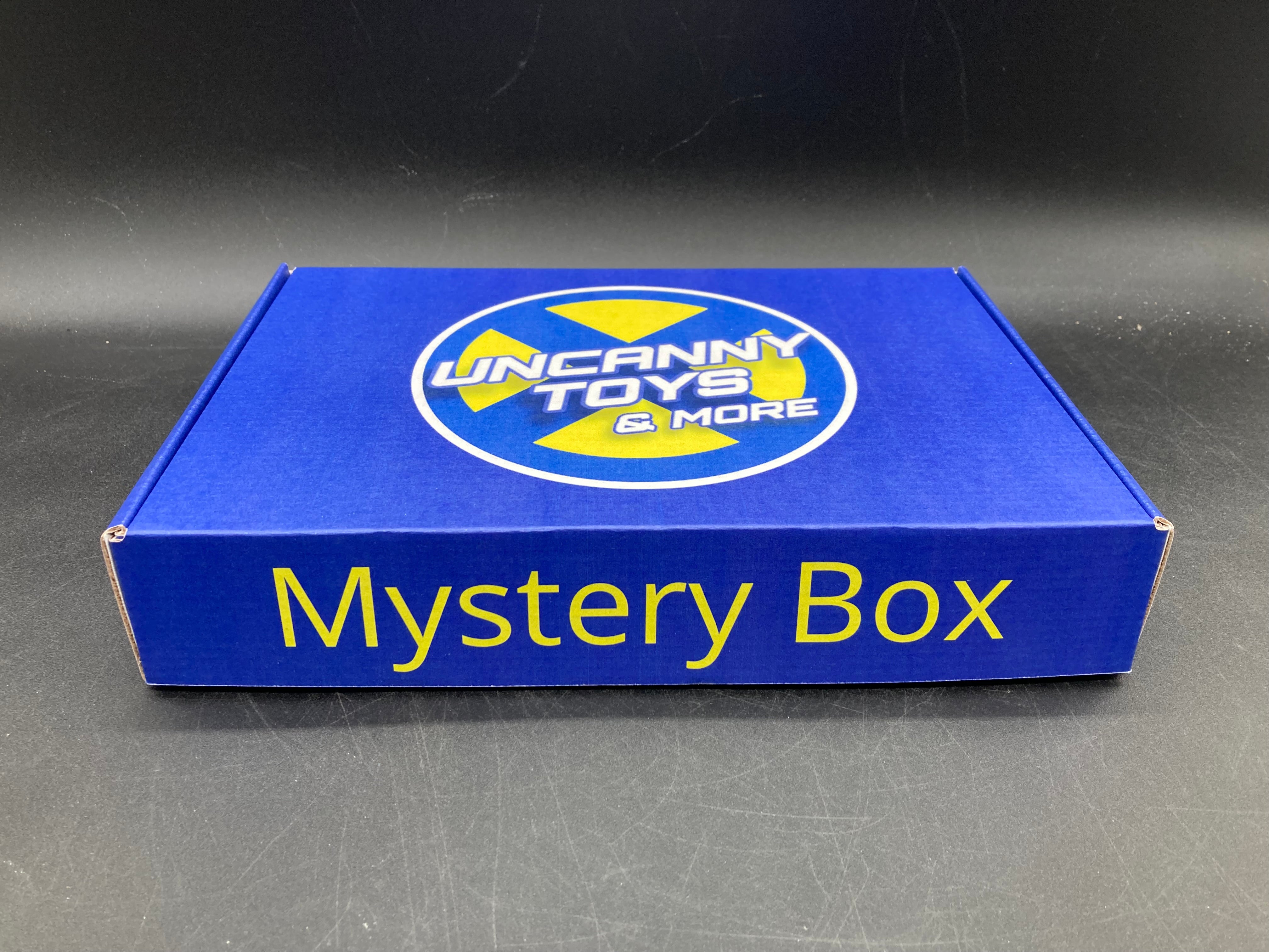 Uncanny Toys & More Action Figure Mystery Box Medium