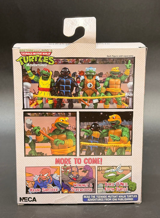 Michelangelo (Stump Arena) Teenage Mutant Ninja Turtles Adventures Action Figure NECA 2026